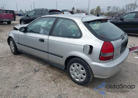 2000 Honda Civic Dx z USA, uszkodzony, nr VIN 2HGEJ644XYH104197